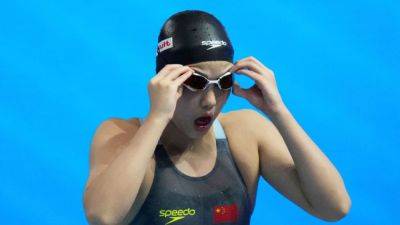 Summer Macintosh - Leon Marchand - China's Yu Zidi, 12, wins relay bronze medal at swim worlds - ESPN - espn.com - France - Usa - Australia - Canada - China - South Africa - Singapore - county Douglas