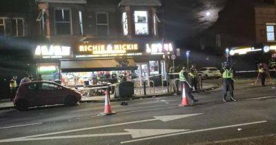 LIVE: Police tape off Manchester shop as man rushed to hospital after stabbing - latest updates