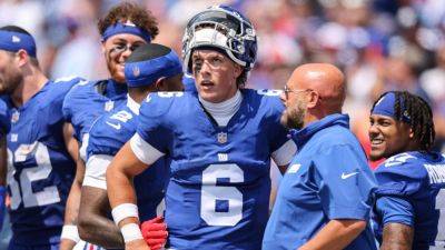How NFL teams approach, develop rookie QBs at training camp - ESPN