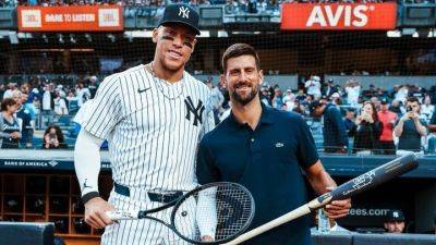 Djokovic delivers first pitch at Yankee Stadium, poses with Aaron Judge - ESPN