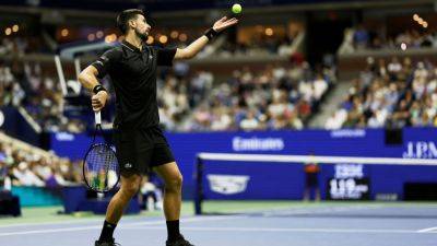 Roger Federer - Cam Norrie - Jimmy Connors - Jan Lennard Struff - Djokovic shakes off back pain, Norrie to reach Open 4th round at 38 - ESPN - espn.com - Germany - Australia - New York