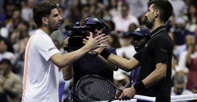 Novak Djokovic overcomes back issue to cruise past Cameron Norrie at US Open