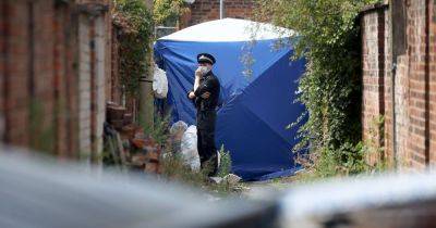 LIVE Police descend on Manchester street after body found in alleyway - latest updates