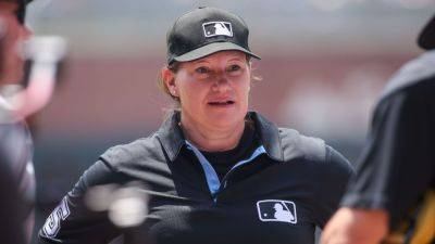 Jen Pawol becomes 1st woman to umpire MLB regular-season game - ESPN