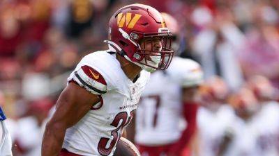 Commanders' Austin Ekeler sustains noncontact Achilles injury - ESPN