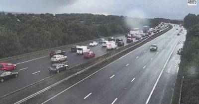 M4 closed in both directions as crash sees overturned vehicle cause misery for drivers - walesonline.co.uk