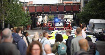 Manchester city centre street taped off by police following discovery of 'suspicious bag'