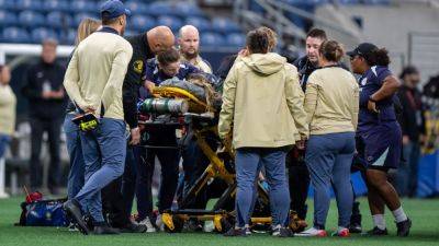 Reign vs. Racing NWSL match abandoned after DeMelo collapses - ESPN - espn.com