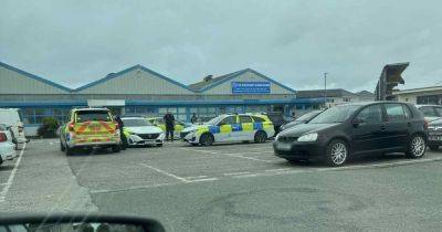Schools in lockdown after reports of person seen carrying axe