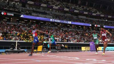 U.S. hurdler wins gold after DQ overturned; Bol a champ again - ESPN