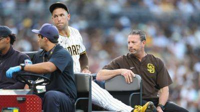 Padres' Jason Adam carted off with ruptured quad tendon - ESPN