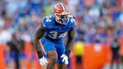 Florida may be down 3 DLs against Miami, sources say - ESPN
