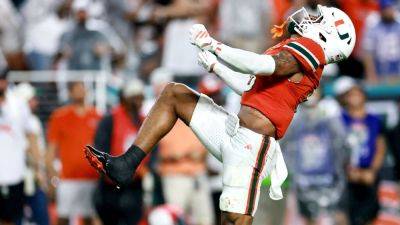 Miami to No. 2; Oklahoma, Indiana, Texas Tech surge in AP Top 25 - ESPN