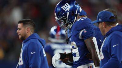 Giants RB Tyrone Tracy exits with shoulder injury vs. Chiefs - ESPN