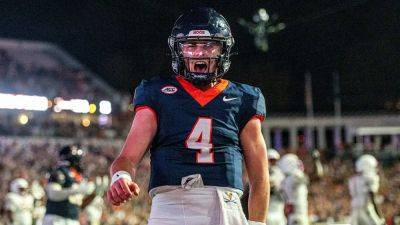 Mike Norvell - Virginia fans rush field after Cavaliers upset Florida State in double OT - foxnews.com - state Indiana - county Thomas