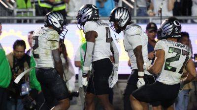 Oregon interception in 2OT seals triumph over Penn State - ESPN