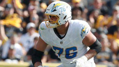 Chargers left tackle Joe Alt carted off with ankle injury - ESPN