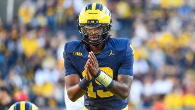Underwood looks to pass first test, join notable true freshman QBs - ESPN