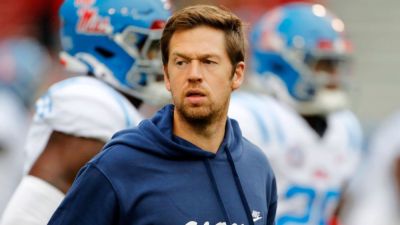 LSU's Weis with Ole Miss for game; has done 'terrific job' - ESPN