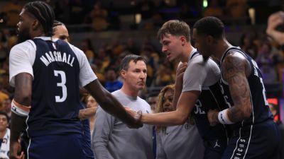 Mavs' Cooper Flagg (shoulder) exits vs. Pacers after hard foul - ESPN