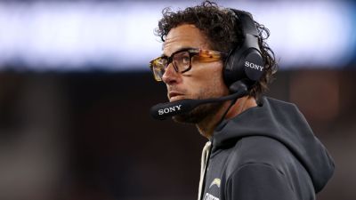 Chargers' Jim Harbaugh says OC Mike McDaniel's job 'not in jeopardy' - ESPN