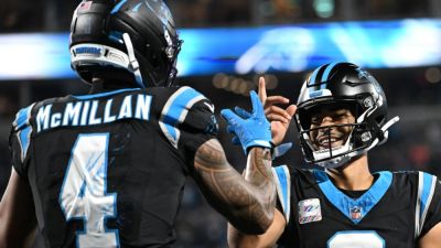 Tetairoa McMillan, Bryce Young star as Panthers defeat Lions - ESPN