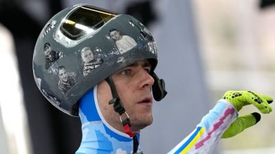 Olympics OKs armband, but Ukrainian athlete pushes for helmet - ESPN