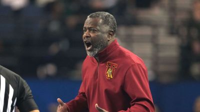 Tuskegee basketball coach Benjy Taylor led off court in handcuffs - ESPN - espn.com - county Taylor