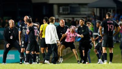 Lionel Messi - Lionel Messi knocked to ground during pitch invasion in Puerto Rico - ESPN - espn.com - Argentina - county Miami - Ecuador - Puerto Rico
