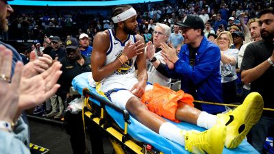 Warriors' Moses Moody leaves game on stretcher after suffering gruesome injury on dunk attempt