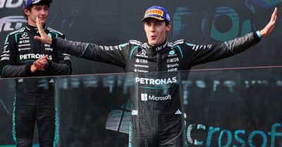 George Russell enjoys ‘hell of a fight’ to win season-opening race in Australia