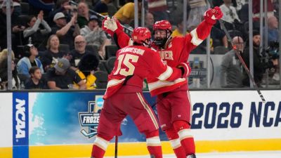 Denver stuns Michigan in 2OT, plays Wisconsin for Frozen Four title - ESPN