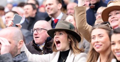 Crowds cheer on as Grand National winner crosses the line