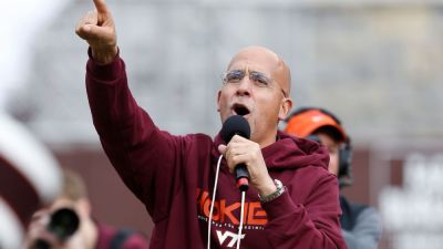 Skydiver rescued after crashing into Virginia Tech scoreboard - ESPN
