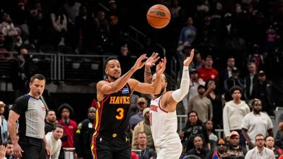 Hawks' last-second heave is too late as Knicks hang on for win