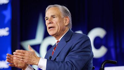 Greg Abbott posts AI image of himself dunking in Spurs jersey to troll Kathy Hochul after Knicks gaffe