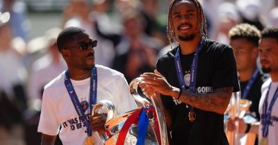 Flavio Cobolli shares in PSG’s Champions League celebrations at Roland Garros