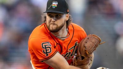 MLB decries use of personal writings on Pride Night hats - ESPN