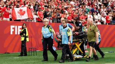 Canada's Ismaël Koné stretchered off after hard tackle - ESPN