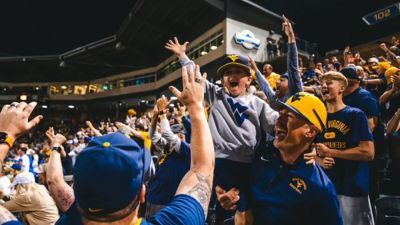 West Virginia's epic walk-off sparks emotional 'Country Roads' celebration that defines college sports