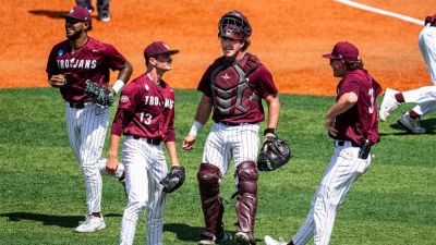 Little Rock baseball team celebrates with bus driver on the field after upset win to advance to Super Regional