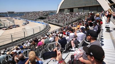 Fan hops fence during red-flagged NASCAR race at San Diego's Naval Base Coronado to meet a driver