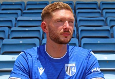 Gillingham manager Gareth Ainsworth signs former St Johnstone and Motherwell defender Liam Gordon on a two-year deal