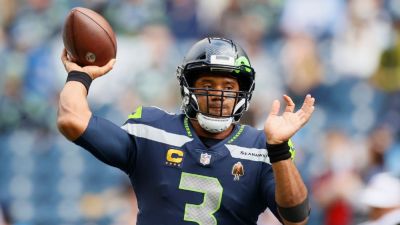 Russell Wilson confirms he's retiring from NFL, joining CBS - ESPN