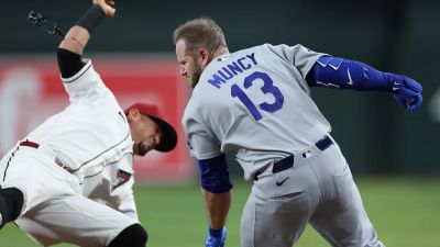 Dave Roberts - Torey Lovullo - Max Muncy - MLB stars leave divisional game after scary collision at first base leaves both injured - foxnews.com - Los Angeles - state Arizona