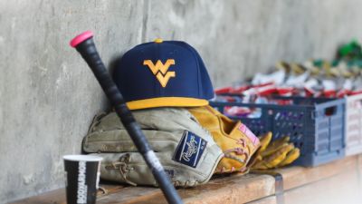 Fans injured as storm hits West Virginia super regional game - ESPN