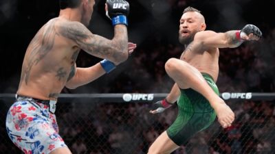 UFC 329 results: McGregor injured, loses to Holloway by TKO - ESPN