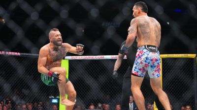 McGregor injures leg on opening kick vs. Holloway at UFC 329 - ESPN