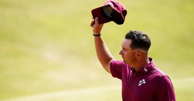 Lucas Herbert leads Open after equalling record for lowest score at men’s major