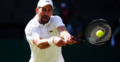 Novak Djokovic recovers from poor third set to continue Wimbledon title bid